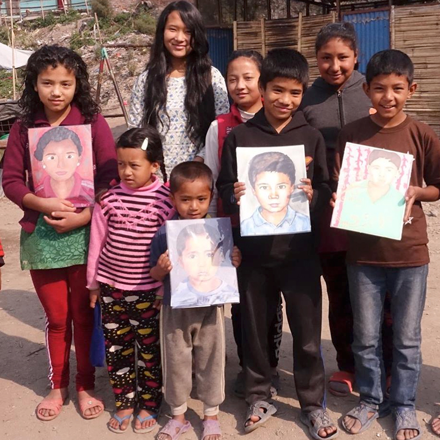 Creating portraits for children living in Nepal.